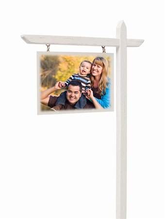family with sold sign - Isolated Real Estate Sign with Clipping Path and Happy Mixed Race Family. Photographie de stock - Aubaine LD & Abonnement, Code: 400-06072556