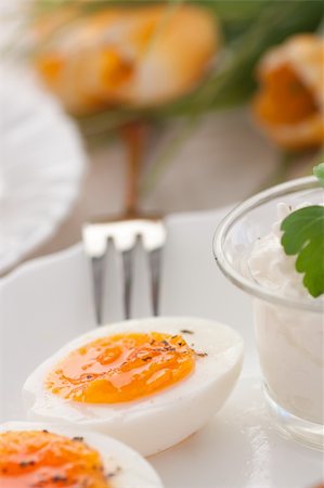 Traditional Easter breakfast. Table setting with Boiled eggs and cottage cheese Stock Photo - Budget Royalty-Free & Subscription, Code: 400-06072750