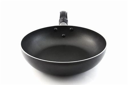 sauteeing - Pan with handle on white background Photographie de stock - Aubaine LD & Abonnement, Code: 400-06073001