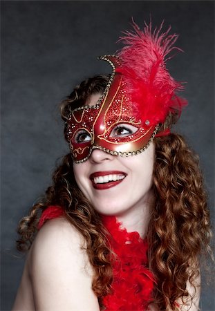 Lady in a red mysterious venetian mask Stock Photo - Budget Royalty-Free & Subscription, Code: 400-06073065