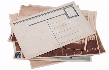 Pile of old postcards with copy space isolated on white background Stock Photo - Budget Royalty-Free & Subscription, Code: 400-06073108