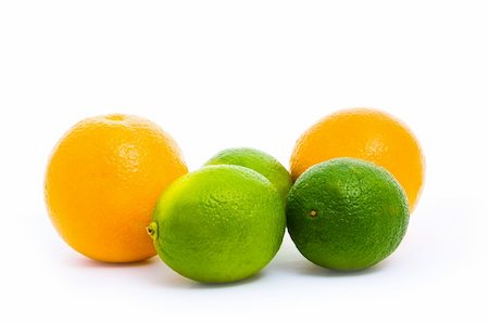 simsearch:400-05240866,k - two oranges and limes isolated on white Fotografie stock - Microstock e Abbonamento, Codice: 400-06073157