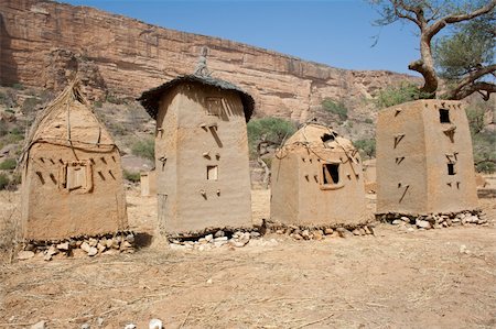 dogon - Granaries in a Dogon village, Mali (Africa).  The Dogon are best known for their mythology, their mask dances, wooden sculpture and their architecture. Photographie de stock - Aubaine LD & Abonnement, Code: 400-06073306