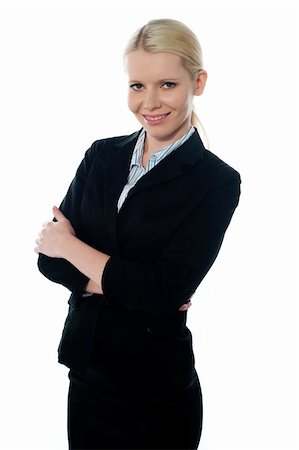 Smiling young femlae CEO posing with folded arms Stock Photo - Budget Royalty-Free & Subscription, Code: 400-06073482