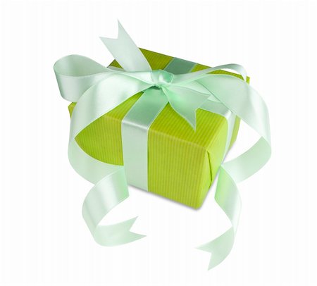 Green gift box with a  bow on white background Stock Photo - Budget Royalty-Free & Subscription, Code: 400-06073828
