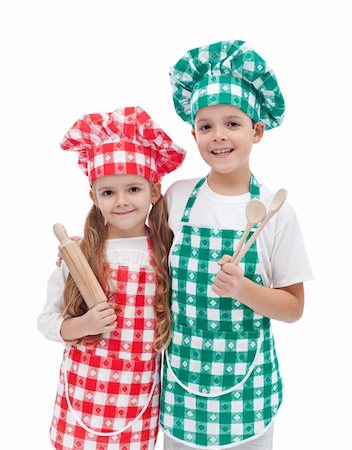 simsearch:400-04114221,k - Happy kid chefs with hats and aprons holding cooking utensils - isolated Stock Photo - Budget Royalty-Free & Subscription, Code: 400-06073995