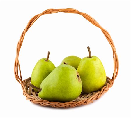 simsearch:400-04402673,k - Green ripe pears in wicker basket isolated on white background Fotografie stock - Microstock e Abbonamento, Codice: 400-06084002