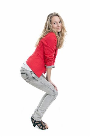 full photo in girls in studio - Full portrait of a young woman wearing jeans and red jacket Stock Photo - Budget Royalty-Free & Subscription, Code: 400-06084235