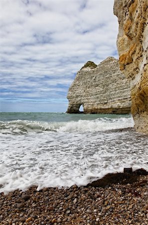 etretat - Image of stones and ocean.Location: La Falaise d'Amont in Etretat on the Upper Normandy coast in the North of France. Photographie de stock - Aubaine LD & Abonnement, Code: 400-06084690