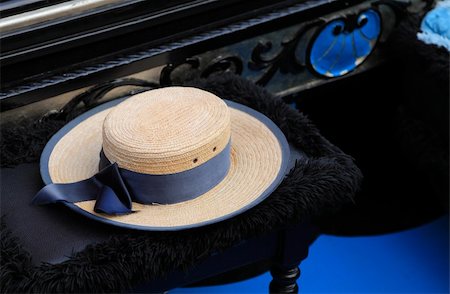 Image of a hat of a gondolier on a specific chair in a gondola. Stock Photo - Budget Royalty-Free & Subscription, Code: 400-06084862