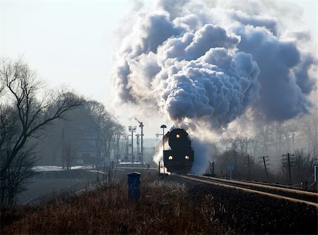 simsearch:862-03288971,k - Vintage steam train starting from the station, wintertime Stock Photo - Budget Royalty-Free & Subscription, Code: 400-06085106