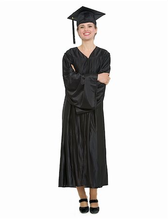 simsearch:6109-06003585,k - Full length portrait of woman in graduation cap and gown. HQ photo. Not oversharpened. Not oversaturated Foto de stock - Royalty-Free Super Valor e Assinatura, Número: 400-06086302