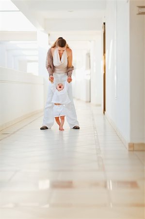 simsearch:400-06086432,k - Happy mother playing with baby outdoor Stockbilder - Microstock & Abonnement, Bildnummer: 400-06086435