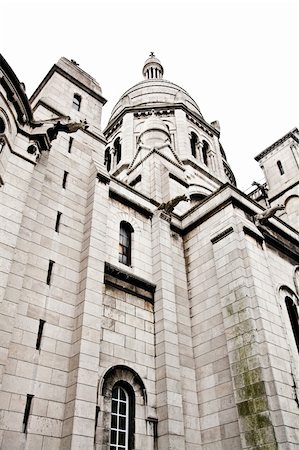 simsearch:400-05170867,k - Detail of the Basilica of the Sacred Heart of Paris, commonly known as SacrÃ©-CÅ?ur Basilica, dedicated to the Sacred Heart of Jesus, in Paris, France Foto de stock - Royalty-Free Super Valor e Assinatura, Número: 400-06086556