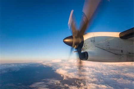 spinning propeller aeroplane - Closeup of an airplane's propeller while in flight, shot from the passenger's cabin. Stock Photo - Budget Royalty-Free & Subscription, Code: 400-06086588