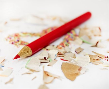 Sharp red pencil among pencils shavings on white background Stock Photo - Budget Royalty-Free & Subscription, Code: 400-06086828
