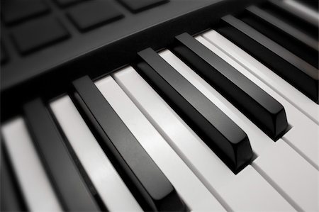 simsearch:400-05676575,k - Close up shot of black & white piano keys Photographie de stock - Aubaine LD & Abonnement, Code: 400-06086888