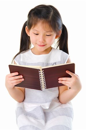 simsearch:400-04131892,k - Little Asian girl reading on white background Stockbilder - Microstock & Abonnement, Bildnummer: 400-06087210