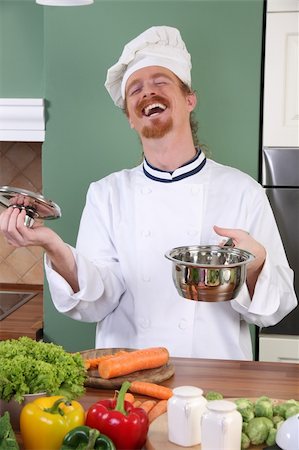 simsearch:400-04116514,k - Young chef with vegetables, preparing lunch in kitchen Stockbilder - Microstock & Abonnement, Bildnummer: 400-06087308
