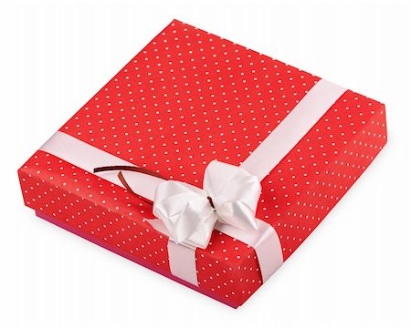 simsearch:400-05747950,k - Red gift box with ribbon isolated on white background Foto de stock - Super Valor sin royalties y Suscripción, Código: 400-06087575