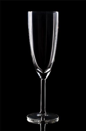 Champaign glass over black background. Studio shot. Foto de stock - Royalty-Free Super Valor e Assinatura, Número: 400-06087684