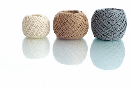 Three  balls of twine on a white background Stock Photo - Budget Royalty-Free & Subscription, Code: 400-06088039