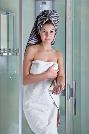 Beautiful smiling girl after a shower in a white towel Stock Photo - Budget Royalty-Free & Subscription, Code: 400-06088777