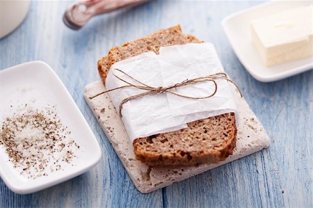 simsearch:400-06088770,k - wholemeal bread with salt, pepper and butter Stock Photo - Budget Royalty-Free & Subscription, Code: 400-06088772