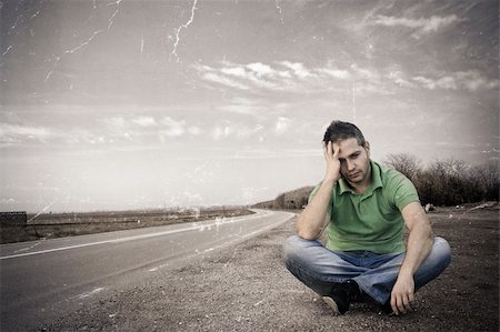 Old photo of a young man sitting out of the road:NOTE-Texture was added to simulate an old image. Stock Photo - Budget Royalty-Free & Subscription, Code: 400-06089202