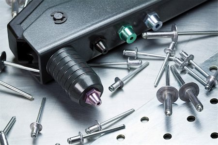 simsearch:400-04849167,k - Metal workshop. Rivet gun, applicator and rivets. Stock Photo - Budget Royalty-Free & Subscription, Code: 400-06080433