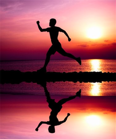 young runner with water reflecting Stock Photo - Budget Royalty-Free & Subscription, Code: 400-06080737