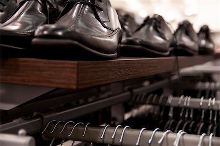 Close-up on shelf with mens, elegant shoes. Shallow depth of field. Stock Photo - Budget Royalty-Free & Subscription, Code: 400-06080977