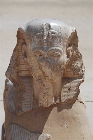 simsearch:400-04848871,k - Egyptian head of a statue made ??of stone and temples Photographie de stock - Aubaine LD & Abonnement, Code: 400-06081865