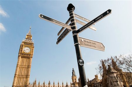 simsearch:851-02961586,k - Low angle shot of Big Ben in London, with directions sign in the foreground pointing to famous tourist attractions around the area. Photographie de stock - Aubaine LD & Abonnement, Code: 400-06082585