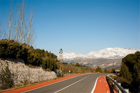 simsearch:400-06083036,k - Scenic road leading through a winter landscape Stock Photo - Budget Royalty-Free & Subscription, Code: 400-06083044