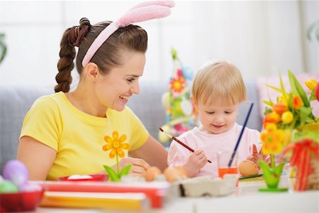 Mother and baby painting on Easter eggs Stock Photo - Budget Royalty-Free & Subscription, Code: 400-06083064