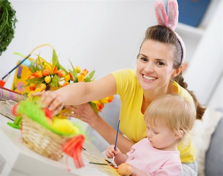 Mother and baby making easter decoration Stock Photo - Budget Royalty-Free & Subscription, Code: 400-06083065