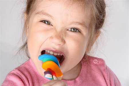 Studio shot of young girl Stock Photo - Budget Royalty-Free & Subscription, Code: 400-06083231