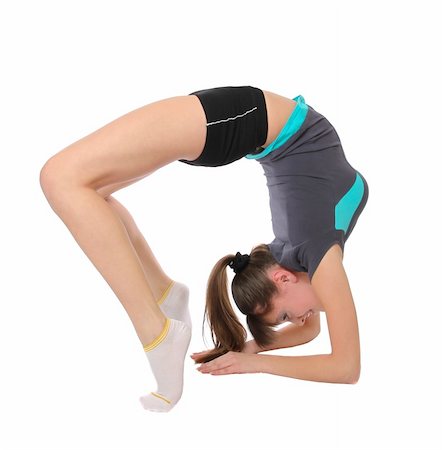 girl in gymnastics poses. Isolated at white background Foto de stock - Super Valor sin royalties y Suscripción, Código: 400-06083289