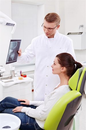 simsearch:400-04340942,k - Dentist patient shows an X-ray Stock Photo - Budget Royalty-Free & Subscription, Code: 400-06083401