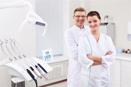 simsearch:400-04340942,k - Dentists in the form at the clinic Stock Photo - Budget Royalty-Free & Subscription, Code: 400-06083414