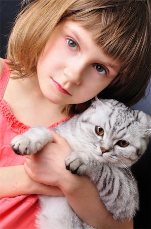 beaituful child girl with her pet cat together Photographie de stock - Aubaine LD & Abonnement, Code: 400-06083538