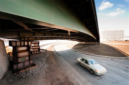 dmitryelagin (artist) - Blurred car moving under an old metal and green bridge Stock Photo - Budget Royalty-Free & Subscription, Code: 400-06083962