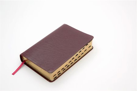 A photo of a Holy Bible Isolated on a white background Fotografie stock - Microstock e Abbonamento, Codice: 400-06094388