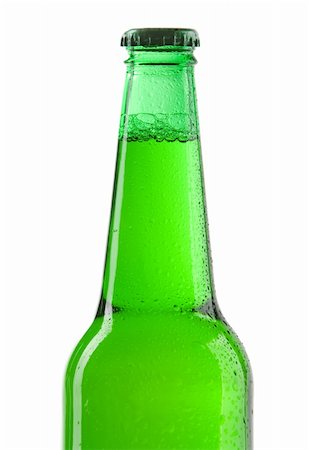 Beer bottle over white background. Close up. Photographie de stock - Aubaine LD & Abonnement, Code: 400-06094604