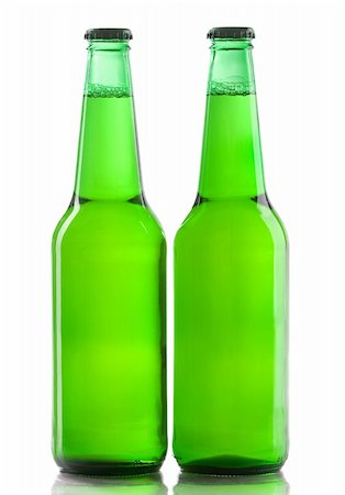 Beer bottles over white background. Studio shot. Stock Photo - Budget Royalty-Free & Subscription, Code: 400-06094606