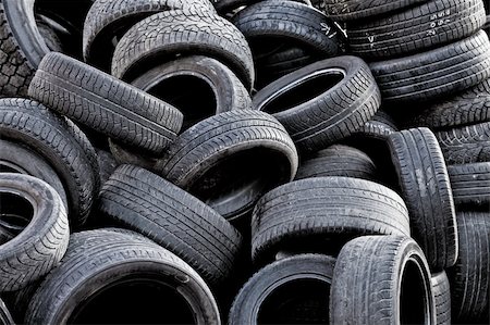 pile tires - Pile of old used car tires. Stock Photo - Budget Royalty-Free & Subscription, Code: 400-06094710
