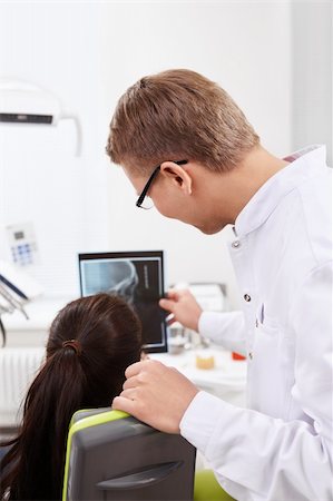 simsearch:400-04340942,k - The doctor shows the patient to X-rays Stock Photo - Budget Royalty-Free & Subscription, Code: 400-06095096