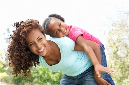 Portrait of Happy Mother and Daughter In Park Stock Photo - Budget Royalty-Free & Subscription, Code: 400-06095655