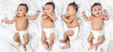 simsearch:400-08835171,k - Baby in 4 different expressions on white satin background Photographie de stock - Aubaine LD & Abonnement, Code: 400-06096170